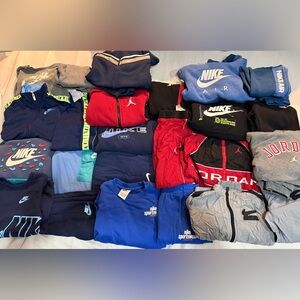 Thirteen boys size 7 Nike and Jordan sets